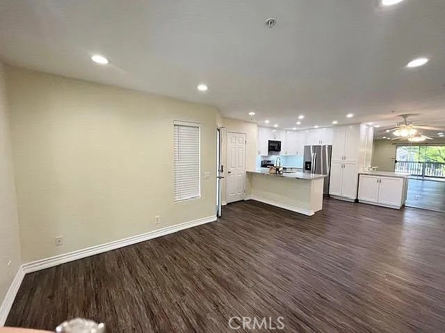 Discover this stunning, upgraded one-bedroom, one-bath condo in the heart of Orange County! Enjoy breathtaking views of city lights and lush greenbelt from the spacious living room, bedroom, and expansive balcony. No buildings obstruct your view—just endless scenery and tranquility.
Located centrally for easy access to all of Orange County, this beautiful home features nice upgrades throughout. The modern kitchen boasts sleek white shaker cabinets, elegant marble countertops with a breakfast bar, and all stainless steel appliances—including a stove, range, microwave, and refrigerator. The bathroom has been tastefully renovated with new cabinets and vanities, complemented by a dressing area and a large walk-in closet in the primary bedroom.
Bright and airy, this open-floor plan offers a generous living space and a large bedroom. Both the living room and bedroom open to a long balcony—perfect for enjoying morning coffee or sunset wines while taking in the serene views. Additional storage is available on both sides of the balcony.
This condo includes an inside laundry, a one-car garage, and plenty of guest parking within the complex. Upgrades include newer flooring, enhancing the modern, elegant feel.