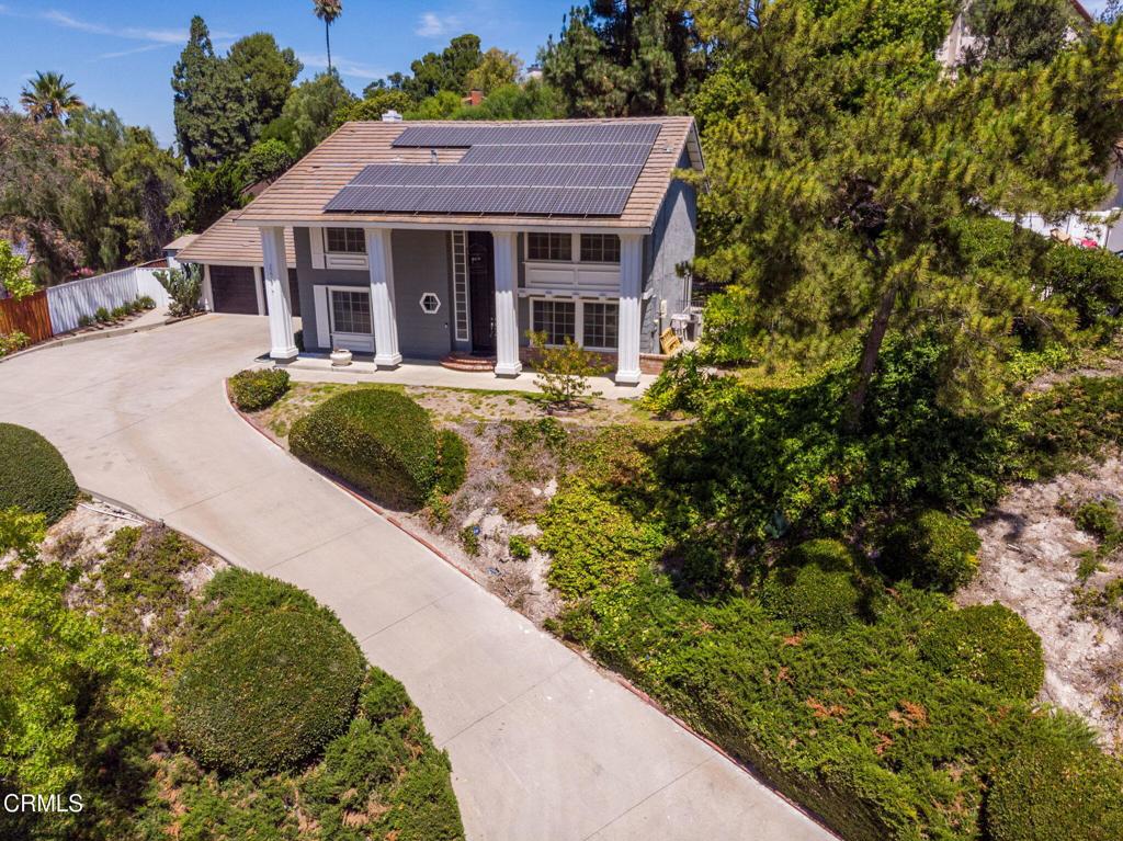 Welcome to Sunset Hills. This 4-bedroom, 3-bathroom, 2,501 sq.ft two-story home is located in one of Thousand Oaks' most well established neighborhoods. This residence combines genuine curb appeal with comfortable living, offering plenty of space for comfortable living. The home features a grand entry staircase, formal living and dining areas with beautiful hard wood floors, and a well-designed kitchen with granite counter tops, wood cabinetry, tile floors, and a breakfast bar that flows into the family room with fireplace. Large windows and sliding glass doors bring in natural light and provide access to the backyard. Upstairs has beautiful hard wood floors as well. The bedrooms are generously sized, including a primary suite with a beautiful bathroom showcasing a soaking tub, walk-in shower, and dual sinks. Additional highlights include a 3-car garage, air conditioning, and solar panels for energy efficiency. The back yard is an entertainer's dream with a pool, perfect for relaxing or hosting gatherings. This home sits on a peaceful-cul-de-sac with mature trees and neighborhood hillside views. Residents enjoy proximity to beautiful parks, hiking, biking trails and Sunset Hills Country Club. Thousand Oaks is known for abundant open space, convenient access to The Oaks Mall, fine dining and cultural venues such as the Civic Arts Plaza. Commuters will appreciate easy access to the 101 Freeway, connecting you to the San Fernando Valley, Conejo Valley, and Ventura County beaches within minutes.