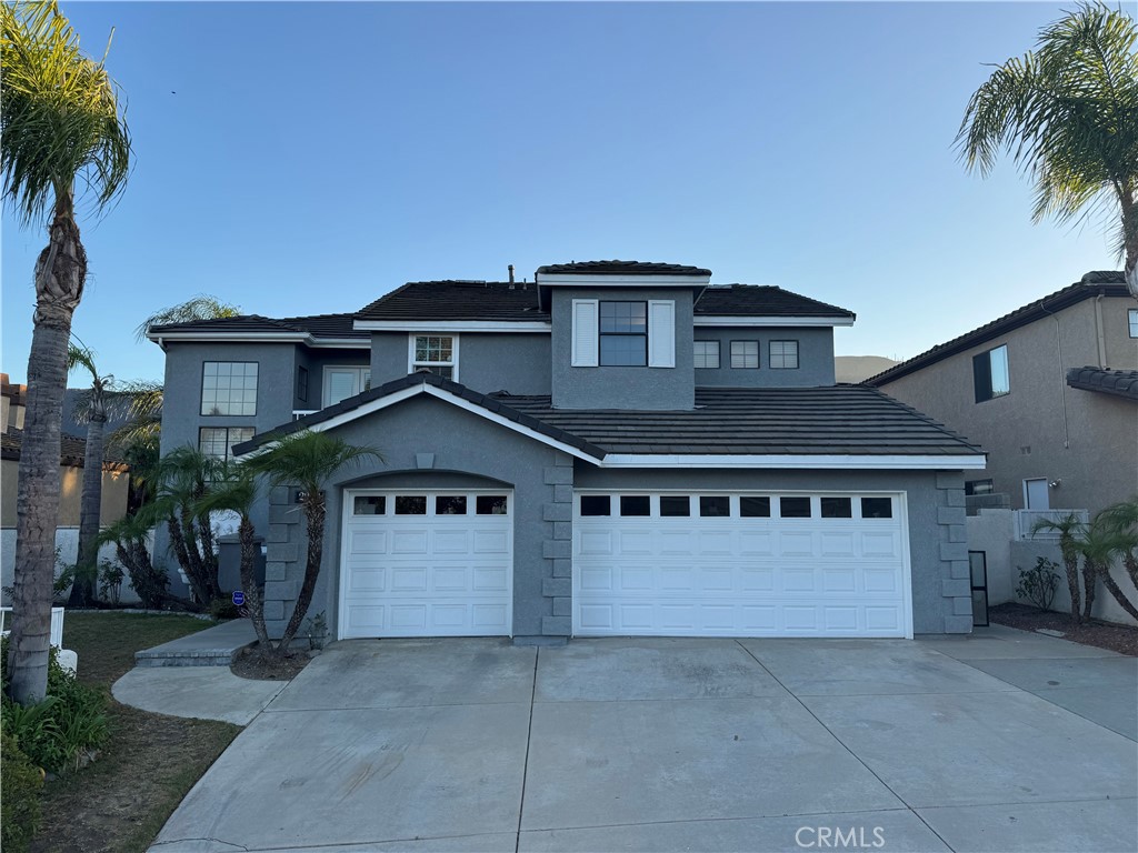 Welcome to your new home, a exit away from Orange County! This stunning 4-bedroom, 4-bathroom residence offers the perfect balance of luxury, comfort, and everyday convenience in one of Corona’s most desirable neighborhoods. From the moment you arrive, you’ll notice the home’s inviting curb appeal, setting the tone for your new home! Step through the front door and into bright, open living areas filled with natural light. Designed with both function and style in mind, the layout seamlessly accommodates everything from lively gatherings to quiet evenings at home. Expansive living and dining spaces provide plenty of room to entertain guests, while still offering cozy corners for family relaxation. The heart of the home flows effortlessly to a private backyard oasis, where resort-style living is yours to enjoy every day. Featuring a brand-new pebble tech pool and spa with high-end finishes, this space is perfect for making lasting memories; whether you’re hosting summer pool parties, enjoying weekend BBQs with friends, or simply lounging with a good book in the sunshine. Newly installed pavers surround the pool and spa, adding both elegance and durability, while creating a polished outdoor space you’ll be proud to call your own. Inside, each of the four spacious bedrooms is thoughtfully designed to provide privacy and comfort. Every bedroom includes its own private full bathroom, offering convenience and flexibility for families, guests, or multigenerational living. The primary suite serves as a true retreat, where you can unwind after a long day and enjoy the peace and quiet of your own personal haven.
Beyond the walls of this beautiful home, you’ll love the convenience of being just minutes from local shopping, dining, top-rated schools, and major freeways. Whether commuting for work or exploring all that Southern California has to offer, you’ll appreciate being perfectly situated for both convenience and lifestyle. Come check it out before its gone!