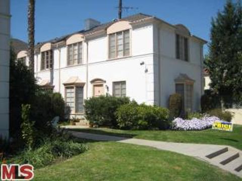 Photo of 1201 S OGDEN Drive, Los Angeles, CA 90019 (MLS # 26837163)