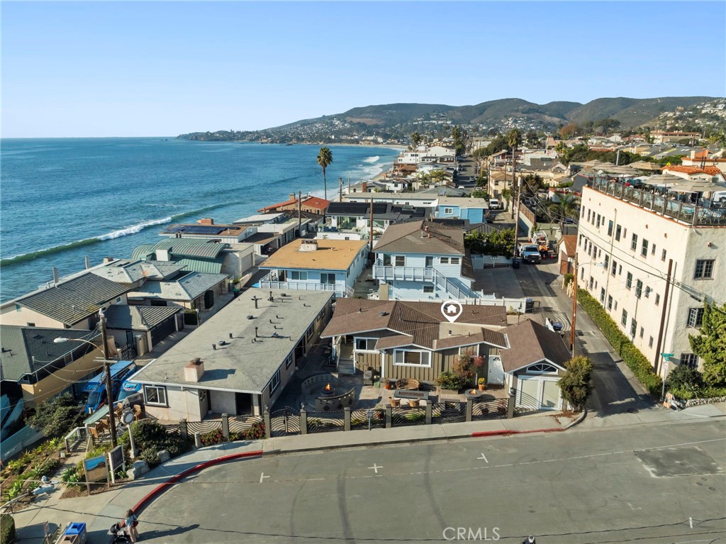 FULLY FURNISHED, PERMITTED VACATION RENTAL TRIPLEX WITH OCEAN VIEWS ONLY STEPS TO CRESS STREET BEACH! Motivated seller has already purchased his next investment! This is one of the most desirable properties, and locations, in all of Laguna Beach! Presenting the Villas of Laguna Vista. Ideal configuration across 2 individual buildings, on a fully hardscaped 7500sf sf lot! Super Host Accounts with AirBNB and VRBO included. The minimum occupancy can routinely reach 75-80% in this location, which ca!n earn in excess of $500,000 annually! Currently, the seller has also enjoyed using the property, therefore occupancy has been closer to 60%, with more than $400,000 in annual income. Includes a single family residence style villa, and completely separate duplex style villas, right at the doorstep of Cress Street Beach. The centerpiece of this extraordinary ensemble is the primary villa, a sophisticated single-level residence offering 3 spacious bedrooms and 2.5 opulent baths. This villa includes a private 1-car garage and a gated driveway accommodating up to 3 vehicles. The additional 2 villas, separated by only one common wall featuring 3 bedrooms and 2 baths, and 2 bedrooms with 1 bath respectively, share a 2-car garage, accessible from Oceanfront street, ensuring privacy and tranquility to the primary villa. Each villa is fully furnished, exuding luxury and comfort, providing guests with an idyllic beach vacation experience year-round. All 3 villas can be found on AirBNB at airbnb.com/h/cresspoint airbnb.com/h/lagunapoint