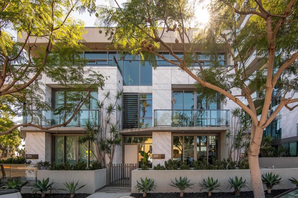 Luxury defined! Newly updated and professionally designed interior accentuates the modern architecture in this stunning townhouse that lives like a single-family home. Plus, the added value of a 'lock-and-go' lifestyle, 24/7 front desk staff and access to luxury high-rise amenities. Experience sophistication & comfort in this rare offering - the largest townhouse at The Park Bankers Hill, one of San Diego’s most prestigious addresses. This contemporary townhouse features three levels serviced by a private elevator. The interior is a triumph, highlighted by floor-to-ceiling glass windows and floating staircases. The floor plan includes two bedrooms, plus a den/office, two and a half baths, a family room, a large dining room, an open kitchen, and a relaxed, cozy living room. Designed to 'blur the sense of indoor/outdoor living', there are five outdoor terraces/patios that infuse San Diego's equable natural sunlight & provide spaces for dining, entertaining, and a curated garden. Creston & Amazon Alexa fully automated Smart Home system conveniently operates lighting, Sonos audio, and solar window shades. The exterior is clad in glass, Volakas marble, and stamped concrete formwork to announce a sophisticated arrival. Sited across the street from Balboa Park's 1,200 acres in the vibrant Bankers Hill neighborhood, this exceptional residence offers a unique opportunity to enjoy upscale urban living just steps away from renowned dining and the city’s cultural landmarks. The Park was completed in 2018 by DIALOG (architects), developer Zephyr, and contractor Balfour Beatty. Lavish amenities include 24/7 front desk staff, private lounge, conference/dining room, full event kitchen, wine room, gym with yoga room, pool, BBQ, two guest suites, and a dog wash. The six townhomes at The Park complement the 14-story luxury tower comprised of 60 modern homes and 2 ground-level retail spaces. The townhouse has 2 parking spaces with an EV charger.