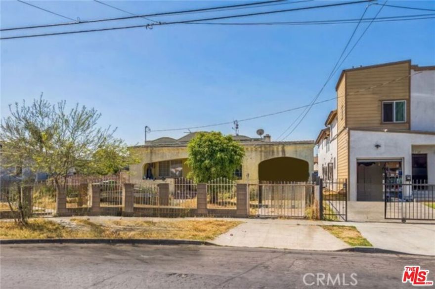 Exciting investment opportunity in a rapidly growing pocket of Los Angeles! This 2-bedroom, 2-bath home offers 968 square feet of living space on a generous 5,405 sq. ft. LAR2-zoned lot perfect for builders, flippers, and value-add investors. The property's zoning and layout provide multiple possibilities: expand the existing home, add an ADU or Jr. ADU or explore a complete redevelopment with multiple units (buyer to verify). Built in 1927, the home sits east of the 110 and south of Century Blvd, with easy access to the 105 and 110 freeways and just a short walk to the Metro Rail making it a commuter-friendly location near major employment centers and transit options. Whether you're looking to build new, add rental income, or bring new life to the existing structure, this property offers outstanding upside potential in a convenient, central Los Angeles location.