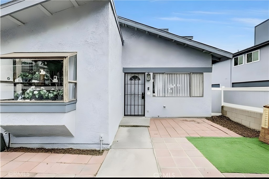 Located in the Foothills of Azusa, this corner unit condo is as large as a single family home! Upon entering you will find a spacious front patio with peaceful views of the foothills. Inside is a living room, adjacent dining room and family room. The kitchen has plenty of cabinet space. Downstairs has tile flooring, attached 2 car garage, half guest bathroom. Upstairs features a large primary suite with ensuite bathroom, walk in closet. The other 2 bedrooms are a good size and there is an additional hallway bathroom upstairs. Upstairs has laminate wood flooring. There is a stair lift/ramp for accessibility to get up the stairs, newer AC unit, new exterior paint. The community has 2 pools/spas, pickle ball courts, tennis courts, clubhouse. Located within walking distance to schools, golf course, parks. Easy access to the 210 freeway. Do not miss out on this opportunity!