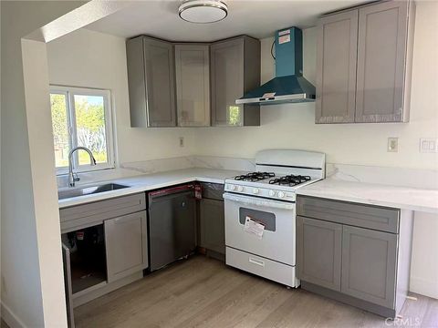 Photo of 8717 Tilmont Ave, Pico Rivera, CA 90660 (MLS # TR26056289)