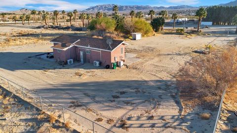 Photo of 4584 Adobe Road, 29 Palms, CA 92277 (MLS # 219133566DA)