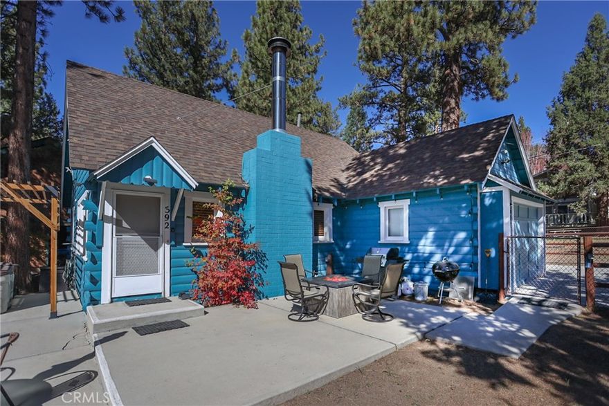 ~ CHARMING BIG BEAR RETREAT IN PRIME MOONRIDGE LOCATION ~ This classic Maltby style home sits on a large 10,000+ SF corner lot in one of the area's most desirable locations - just across the street from the new Rathbun Creek Trail walking path and a short walk to the up-and-coming Moonridge Corridor, where you'll have easy access to all it has to offer. Inside the 2 bedroom 1 bath home, you'll find a well-maintained interior featuring new flooring throughout, new appliances, and a beautiful native rock fireplace. This home also includes a bonus laundry/mud room, making it very functional. Outside there is a large patio for outdoor gatherings and BBQs and a spa looking out to the serenity of the mountains and even ski slope views. We have a 1 car garage and 2 separate outdoor sheds for lots of storage. It is a current STR (short-term rental) and sold completely furnished, this home is completely turn-key, just bring your toothbrush and start enjoying mountain living at its best!!