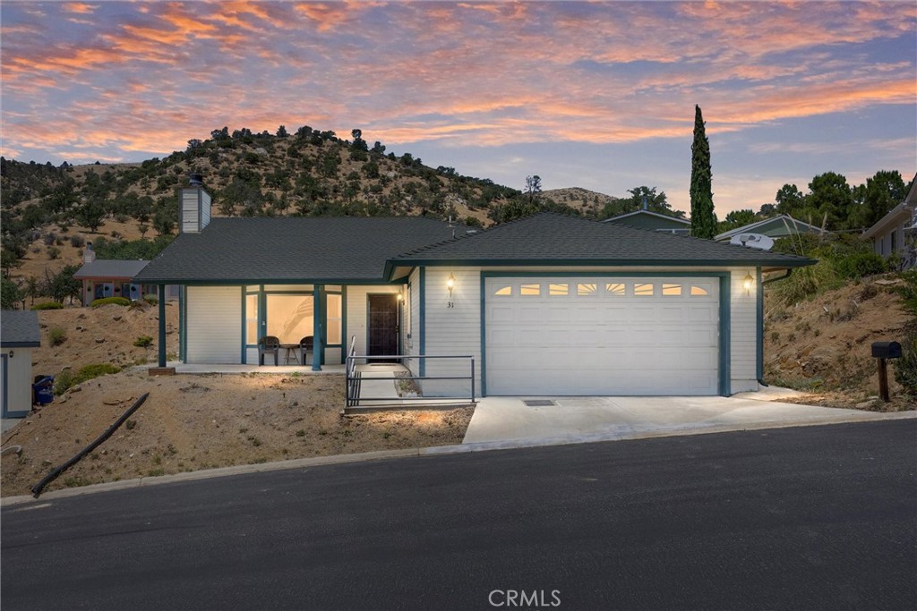 Charming Opportunity in West Golden Hills! Located in the gated community of Golden Highlands, this solid single-family residence sits near the top of a quiet cul-de-sac and offers sweeping views of the valley below. Originally a 3-bedroom, 2-bath home, it has been converted to a 2-bedroom, 2-bath layout, providing a spacious primary suite complete with a private bath, large closet, and extra recreational space.
The kitchen offers generous storage, pull-out shelving, and a large center island perfect for meal prep or casual gatherings. Enjoy the warmth of the inviting brick fireplace in the main living area, with an adjacent formal dining room ideal for relaxing or entertaining.
French doors open to a small, private backyardgreat for quiet evenings or morning coffee.
This home is being sold as-is, and is ready for your personal touch. With solid bones and lots of potential, it's a great opportunity to create your own vision. Schedule a showing today!