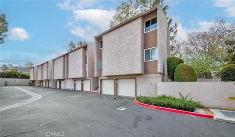 Photo of 1525 Walnut Leaf Dr #211, Walnut, CA 91789 (MLS # TR26065537)