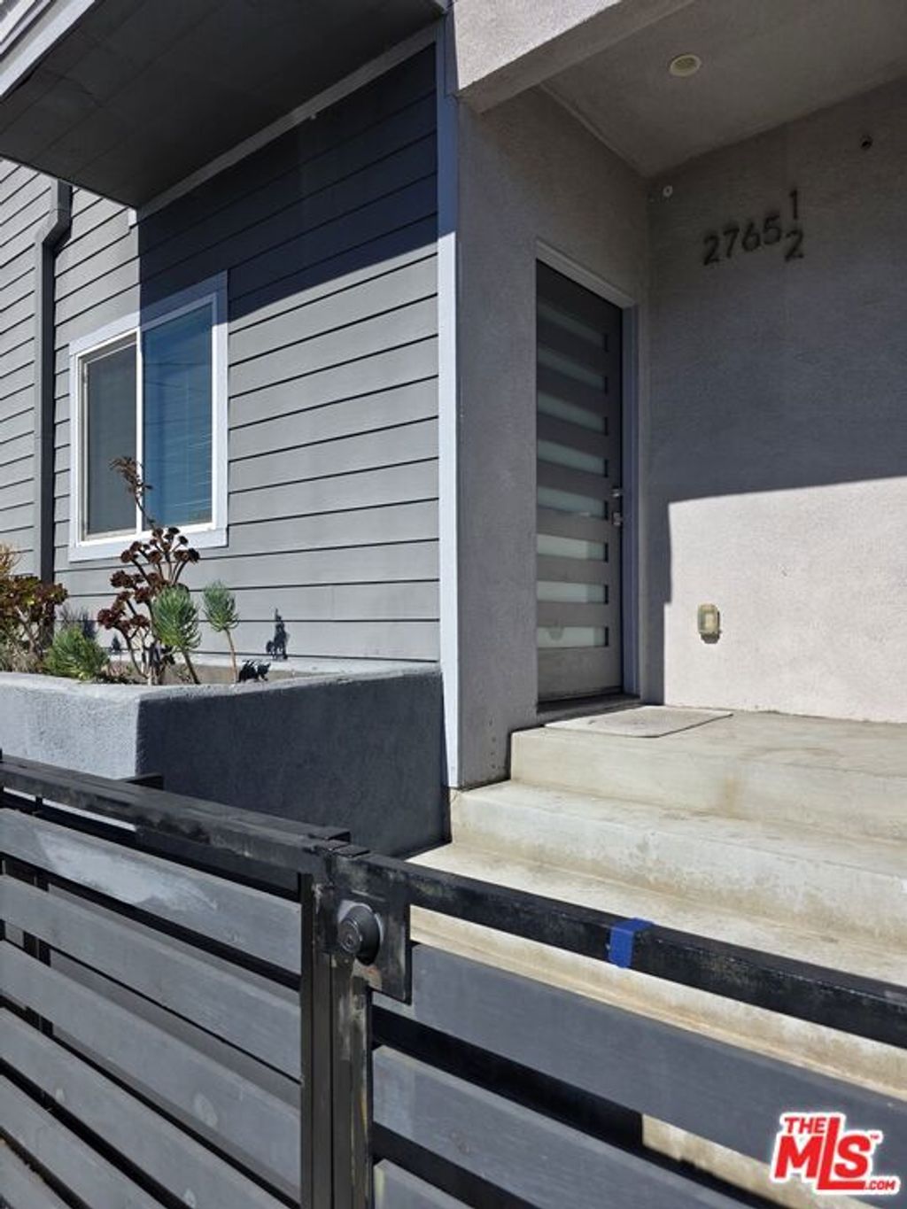 Photo of 2765 1/2 W 12th Street, Los Angeles, CA 90006 (MLS # 25611971)