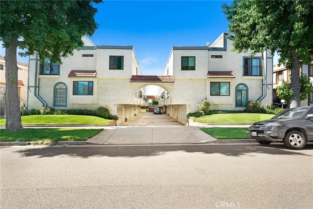 Welcome to Unit E at 2620 W Grand Ave—a beautifully updated 3-bedroom, 2.5-bath townhome-style condo in the heart of Alhambra. This bright unit features abundant natural light, a double-door entry, high ceilings, and a spacious layout. The inviting living room includes a cozy fireplace and leads just a few steps up to a formal dining area and large family room—ideal for both entertaining and everyday living. The remodeled kitchen showcases sleek quartz countertops, stainless steel appliances, and a convenient breakfast bar. Enjoy new waterproof plank flooring, fresh interior paint, and 2.5 tastefully updated bathrooms. The oversized master suite offers vaulted ceilings, two closets, and a modern en-suite bath. With an attached two-car garage, and a lot of storage, in-unit laundry, and a prime location just steps from Alhambra Park, shopping, and dining on Main Street, this move-in ready home blends comfort, style, and convenience.