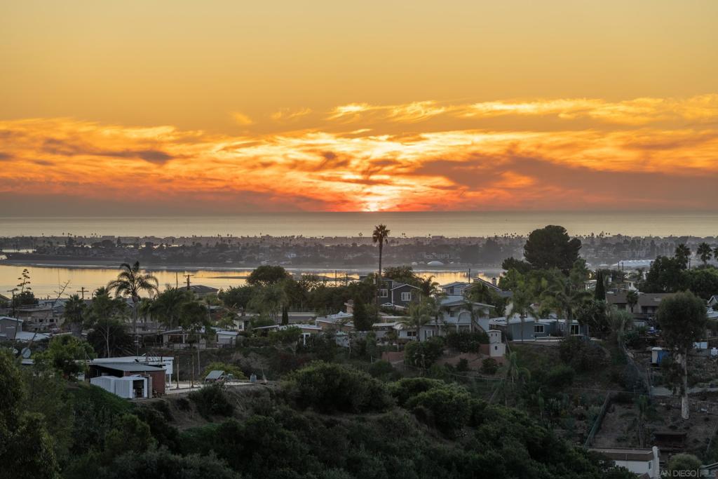 Experience luxurious coastal living in this stunning completely remodeled single-level condo in Bay Park. This 2 bedroom, 2 bath residence boasts panoramic ocean and bay views that will take your breath away. Every detail has been thoughtfully upgraded with high-end appliances, Italian Carrera marble tile, recessed lighting, and top-of-the-line finishes throughout. The home features brand new dual-pane windows and doors, providing energy efficiency and breathtaking views from almost every room. With a seamless top-to-bottom renovation, this gorgeous condo offers a modern and elegant space perfect for enjoying picturesque sunsets and bay breezes. Don’t miss this rare opportunity to own a meticulously updated, move-in-ready coastal retreat.