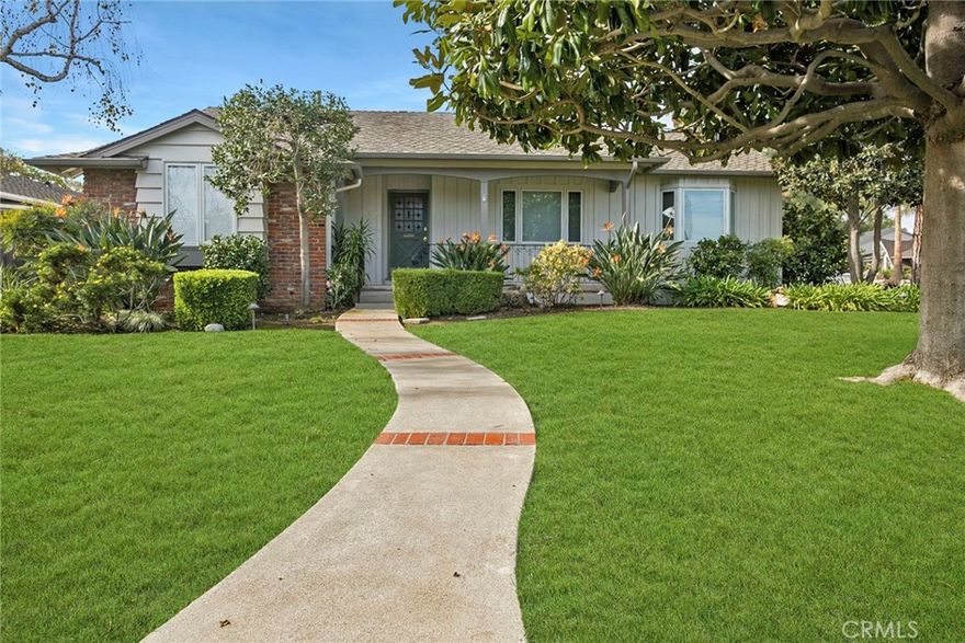 Situated in the wonderful Las Palmas/Hermosa neighborhood, you will find this desirable corner lot home, with a serene, park-like setting.  This beautiful house offers exceptional curb appeal and a welcoming presence. Inside is a spacious 2-bedroom, 2-bath layout featuring a very large living area with an adjacent dining space, plus a generous bonus area ideal for a den, home office, or flex space. Gorgeous hard wood flooring in main living area. The updated kitchen is both functional and stylish, complemented by beautifully remodeled bathrooms. Additionally, there is an inside laundry area.  Step outside to an amazing backyard designed for enjoyment, complete with fruit-producing trees, roses and a covered patio—perfect for relaxing or entertaining in a peaceful outdoor setting. A detached three-car garage adds convenience and ample storage.  A wonderful opportunity to enjoy a terrific neighborhood, comfort, space, and an inviting indoor-outdoor lifestyle.