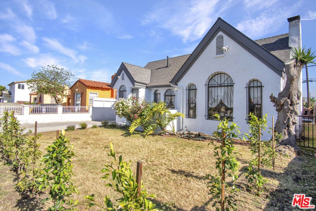 Photo of 1728 W 81st Street, Los Angeles, CA 90047 (MLS # 26829845)