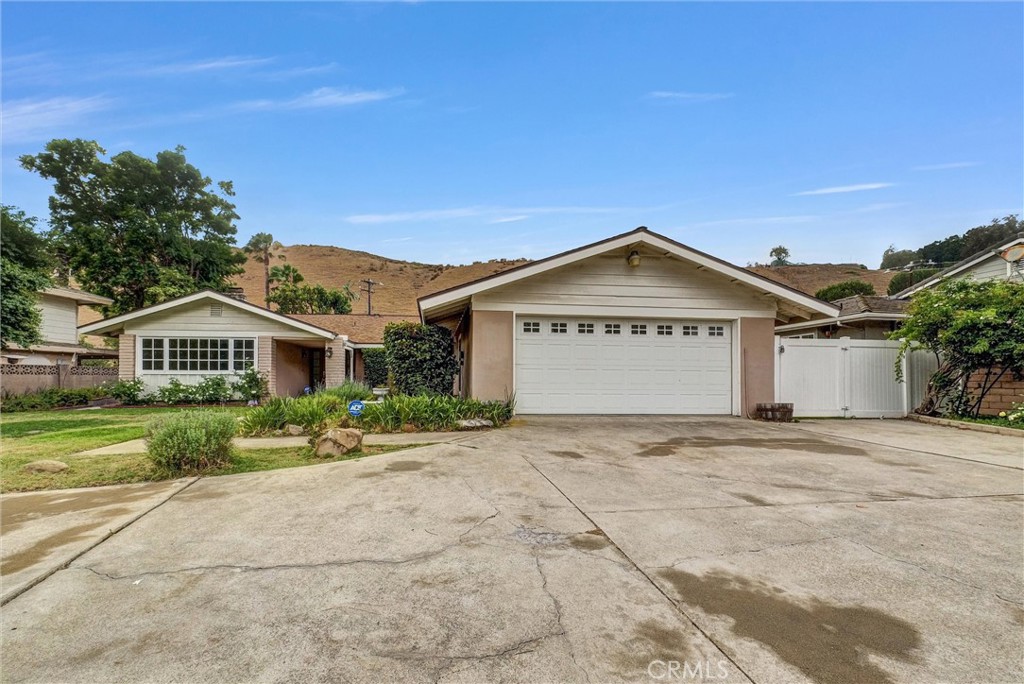 Welcome to this beautifully maintained single-story 4-bedroom, 3-bathroom home located in the highly desirable Olinda Village neighborhood. Situated on an extra-large lot, this home offers the perfect blend of comfort, space, and privacy, making it an ideal retreat while still being conveniently close to everything you need. Step inside and you’ll immediately appreciate the open floor plan that creates a bright and spacious atmosphere, perfect for both everyday living and entertaining guests. The generous living areas flow seamlessly, offering plenty of room for family gatherings, quiet evenings, or hosting friends. The home’s private and peaceful backyard is a true highlight, surrounded by mature landscaping that provides a tranquil setting with ample space to relax, garden, or expand. With room to grow, this property also offers RV parking and plenty of space for additional vehicles, toys, or future possibilities. While the home feels secluded and private, its location provides easy access to freeways, top-rated Brea Olinda School District, shopping, and dining, making daily commutes and errands simple and convenient. Schedule your private tour today!
