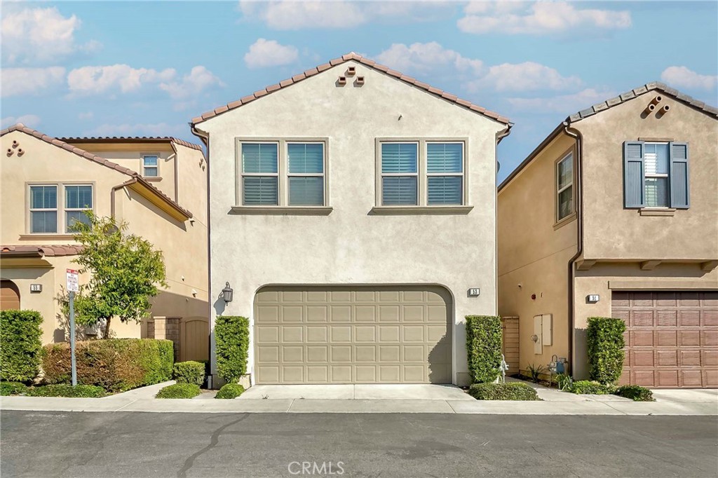 Welcome to this beautiful two-story detached Casero Plan 1 home in the highly desirable Portola Springs community. Perfectly situated at the end of a peaceful cul-de-sac, this residence features a lush, tropical landscaped yard and an inviting open floor plan. The light-filled entry flows into a spacious family room with a cozy fireplace, while the spotless kitchen boasts upgraded stainless steel appliances, granite countertops, an island, and a built-in desk with cabinetry—ideal for a home office or homework station. The kitchen and dining area open to the backyard through expanded sliding doors, creating a seamless indoor-outdoor living experience.
Upgrades include newer tile flooring on the main level, a Tesla charging station, and a tankless water heater. Upstairs, the generous primary suite is accompanied by two additional bedrooms and a versatile loft space. Enjoy the many community amenities including swimming pools, spas, a kids’ pool, picnic areas with BBQ, tennis courts, basketball court, soccer field, and scenic parks. Conveniently located near top-rated Portola Springs Elementary, Discovery Park, Voyager Park, hiking trails, Woodbury Town Center, Irvine Spectrum, fine dining, and with easy freeway access—just 20 minutes to the beach. Award-winning Irvine Unified School District, low tax rate, and low HOA.