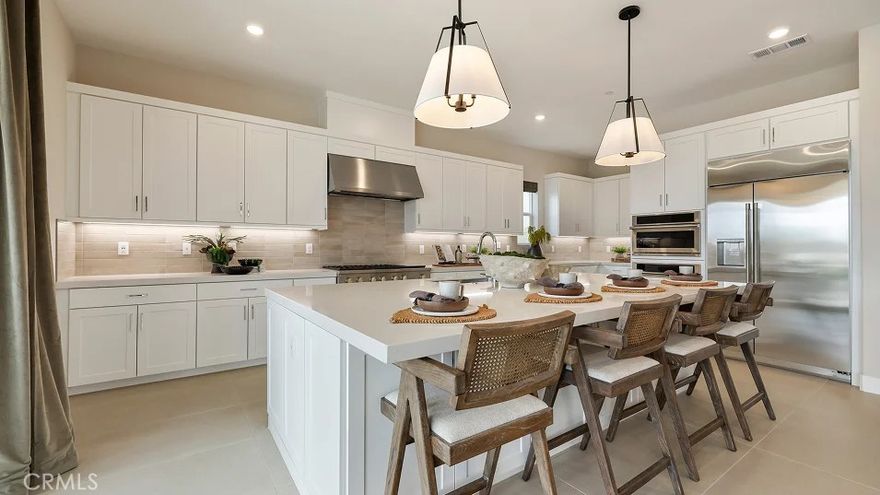 This expansive two-story home offers plenty of space with a total of 4 bedrooms with one of the bedrooms located downstairs with its own private bathroom. The first floor also offers a flex space perfect for an office or gaming room. The rest of the first floor features an open layout from the modern kitchen that offers white cabinetry throughout, massive walk in pantry.  The dining and family room opens to a covered California Room ideal for indoor-outdoor living.   The second floor hosts a bonus room along with three more bedrooms. The luxe owner's suite is  has a walk in close.