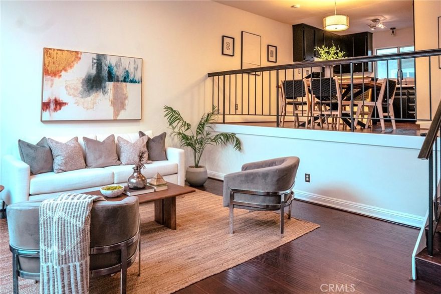 Welcome home to this stylish multi-level townhouse in a SECURE, GATED complex, featuring its OWN PRIVATE GARAGE with additional STORAGE SPACE - a valuable find in Sherman Oaks. This thoughtfully designed residence offers 2 bedrooms and 2.5 bathrooms, along with a versatile BONUS AREA perfect for a small sitting space, home office, or reading nook.

The first floor showcases laminate WOOD FLOORING and HIGH CEILINGS, creating an open and inviting living area, while the second level offers comfortable carpeted bedrooms. Additional highlights include in-unit laundry, central A/C and heat, and a PRIVATE PATIO ideal for everyday enjoyment.

Residents enjoy low HOA dues and access to a sparkling community pool. Conveniently located near Westfield Fashion Square, Ventura Boulevard, shopping, dining, and major freeways, this home is perfect for first-time buyers or professionals seeking comfort, convenience, and low-maintenance living in a prime Valley location.