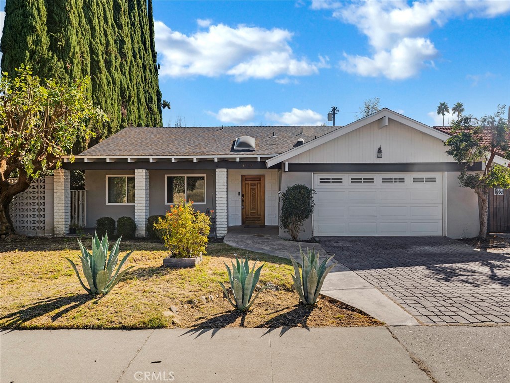 Welcome to this beautifully updated 4-bedroom, 2 1/2 bathroom home located in one of West Hills' most desirable neighborhoods! As you enter, you're greeted by a spacious open-concept layout that combines the living room, dining area, and kitchen—perfect for entertaining. The home features stylish vinyl wood flooring throughout, offering a clean and modern look. The remodeled kitchen includes a convenient breakfast bar and comes fully equipped with stainless steel appliances, including a refrigerator, dishwasher, range/oven, and microwave—ideal for any home chef. The large primary suite offers a remodeled en-suite bathroom and plenty of closet space, while the three additional bedrooms share a second updated full bath. This home also includes an attached 2-car garage, washer and dryer hookups for your convenience, and central air conditioning and heating to keep you comfortable year-round. The private, spacious backyard is perfect for outdoor entertaining or simply relaxing. Centrally located near great restaurants, entertainment, and shopping, this West Hills gem is one you won’t want to miss!