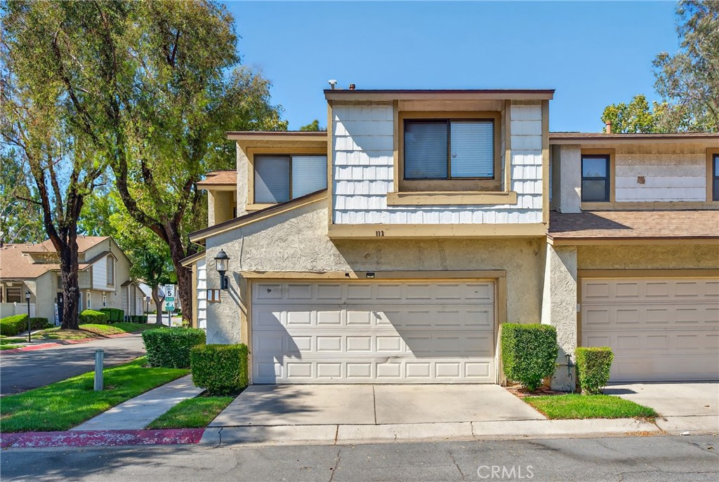 Welcome to this beautiful 2-story condo, perfectly situated on a desirable corner lot. This home features 3 spacious bedrooms and 2.5 baths, with high vaulted ceilings and laminate flooring throughout, giving the home an open and airy feel. The sliding glass door opens to a private backyard, offering a serene outdoor space with checker pavers perfect for BBQs and entertaining guests. In both the master en suite bath and hallway bathroom, there are upgraded sliding shower glass that enhance the home’s modern appeal. The community offers plentiful trees and greenery, a pool, and 2 spas. Enjoy easy access to some of the best shoppings, restaurants, and entertainment options in Ontario Mills and Victoria's Garden. Commuting is a breeze with quick access to I-10, I-15, and SR-60, plus Metrolink’s Ontario–East Station nearby. For frequent travelers, Ontario International Airport is just minutes away. This modern, move-in ready home offers both style and convenience, making it the perfect place to call home!