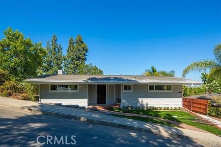 Newly renovated Mid-Century home sits in the gorgeous San Rafael Hills neighborhood of Pasadena. This Mid-Century home retains its original features and charm. Spacious light-filled Living Room with large picture windows with dramatic hillside/treetop views. Open concept kitchen adjacent to the dining area. One master suite. Another good sized bedroom. The cozy den, which could be used as the third bedroom or office. Separate laundry area inside the closet . Private rear yard. Central A/C. Detached 2-car garage. Close to Old Pasadena, Rose Bowl, local park and library. Easy access to major freeways , downtown Los Angeles and Burbank studios. Available date : 9/1/2025.