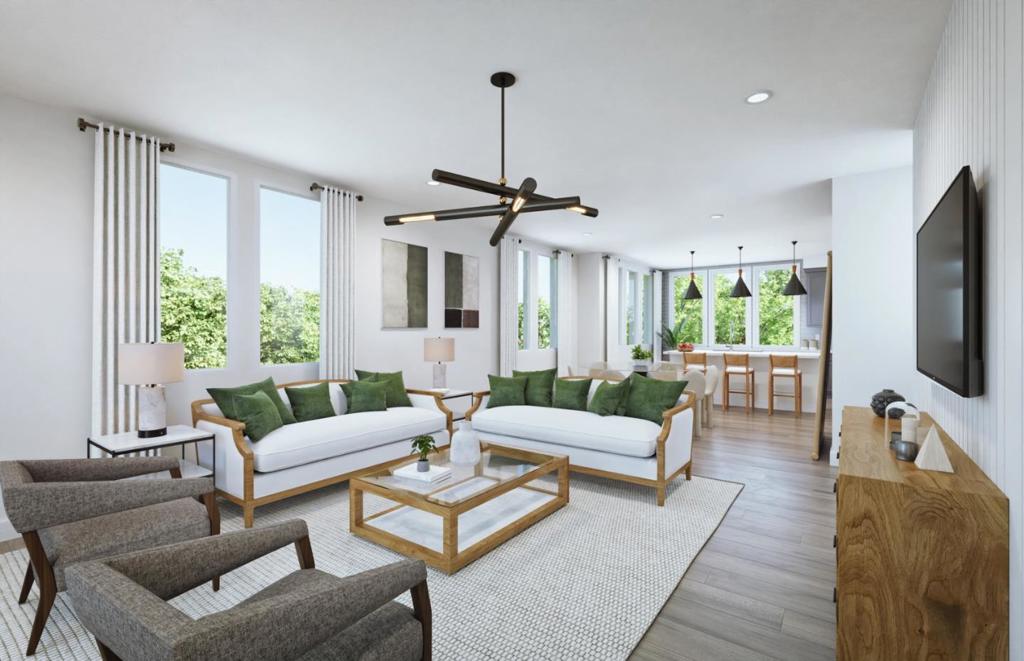 This spacious, fully upgraded Plan D corner home features a gourmet kitchen with upgraded cabinets and countertops, an open floorplan with modern finishes, and a large private deck perfect for entertaining in a bright, stylish setting. Photos are renderings not of actual home.
