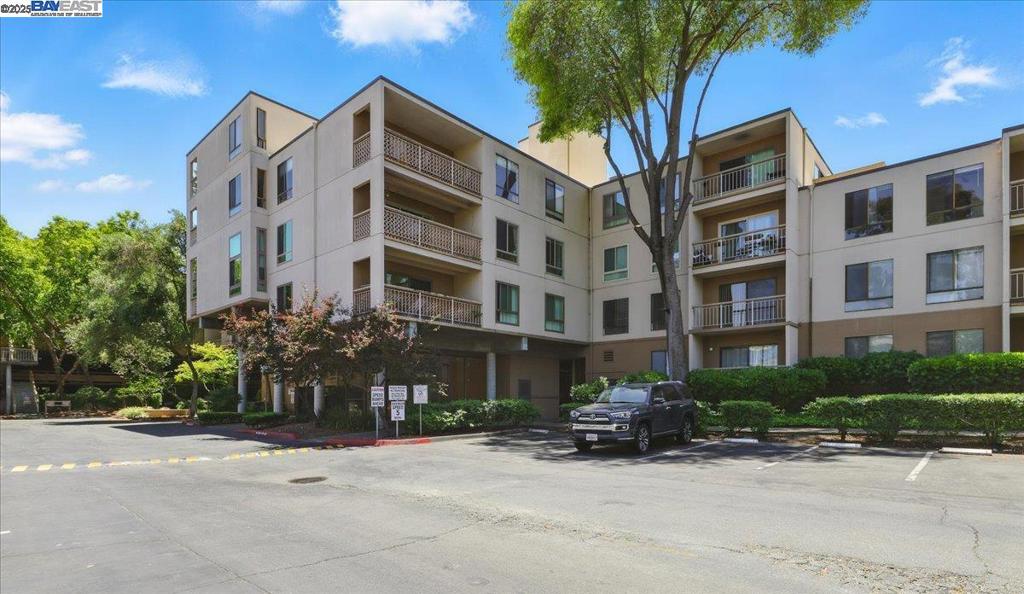 Welcome to this delightful condo in the vibrant heart of Walnut Creek, where resort-style living meets everyday convenience and tranquility. The modern open-concept layout is designed to maximize both comfort and functionality. Enjoy your own private balcony—an ideal spot to relax with a cup of tea after a busy day. The updated kitchen features stainless steel appliances with wood flooring throughout the home. A spacious bedroom offers generous closet space, and the updated bathroom includes an additional hallway vanity for extra convenience. A separate storage locker is also included. Residents enjoy access to fantastic amenities such as swimming pools, tennis courts, a billiards room, gym, and clubhouse. All just minutes from downtown Walnut Creek, BART, dining, shopping, and scenic trails. Don’t miss the opportunity to make this exceptional home your own!