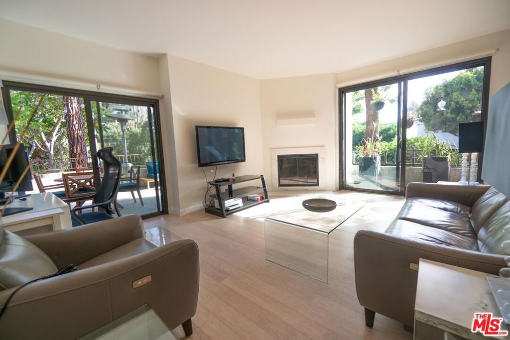 Incredibly special corner unit with a very rare oversized patio. Beautifully updated throughout. The kitchen features stainless steel appliances, basin sink and pretty updated cabinets. Plentiful natural light with wrap-around windows and power blinds throughout. The bathroom has an enormous glass and tile shower, towel warmer and a beautiful vanity and sink. Large bedroom has fantastic closet space with built-ins, shelving and a private slider onto the patio. In-unit stacked laundry. Two car tandem parking in the gated garage that is locationally desirable to the condo. SeaGate Village has a ton of amenities including 2 pools, 3 hot tubs and 2 tennis courts.
