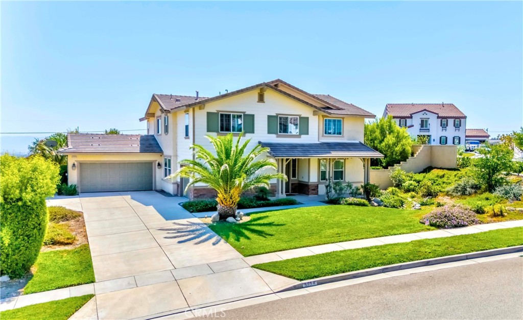 Exquisite 5-Bedroom Foothill Home with Pool & Views. Stunning 5 bed, 3 bath, 3,700 sq. ft. home on a large corner lot with city light and mountain views. Features soaring ceilings, plantation shutters, crown molding, scraped wood flooring, and plush neutral carpet. Gourmet kitchen offers granite counters, oversized prep island, stainless steel appliances, and double-door pantry, opening to spacious family room with fireplace. Downstairs bedroom with full bath ideal for guests or multi-gen living. Upstairs includes a loft/bonus room, 3 bedrooms, full bath, and luxurious primary suite with dual walk-in closets, soaking tub, and separate shower. Private backyard oasis with covered patio, sparkling pool/spa, and landscaped lawn. Additional highlights: 3-car windproof garage with 2 EV chargers, newer AC condenser, reinforced secure front door, laundry room, smart home features, and exterior camera system. Close to top schools, parks, shopping, dining, and Victoria Gardens. A perfect blend of comfort, sophistication, and convenience!