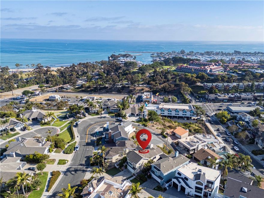Located in the heart of Lantern Village, this 3-bedroom, 2.5-bath home offers stunning panoramic views of Dana Point Harbor, the Pacific Ocean, and city lights, all just steps from the sand. Set on a quiet cul-de-sac, the property combines comfort, functionality, and an unbeatable coastal location.



The main level features a bright, open floor plan with a living room centered around a fireplace and French doors that open to a patio overlooking the ocean. The formal dining area and kitchen flow together seamlessly, ideal for entertaining. The kitchen is equipped with white cabinetry, a breakfast nook, KitchenAid stainless steel appliances, a gas cooktop, wine cooler, and Sub-Zero refrigerator/freezer. A powder bath and laundry room complete the main floor.



Upstairs, the primary suite showcases expansive ocean views, a walk-in closet, and dual sinks. Two additional bedrooms feature mirrored closets and large windows that bring in natural light and coastal breezes. A spacious bonus room with vaulted ceilings and a fireplace provides the flexibility for a second living area, game room, or home office - all with exceptional views.



Additional features include dual-pane windows, and an attached two-car garage. With no HOA, you’ll have the freedom to make this home your own.



Ideally positioned near Lantern Village’s shops and restaurants and just minutes from the newly revitalized Dana Point Harbor, this property offers an exceptional opportunity to enjoy the best of Southern California coastal living.



Schedule your private tour today and experience the best of Dana Point living at 34145 Calle La Primavera