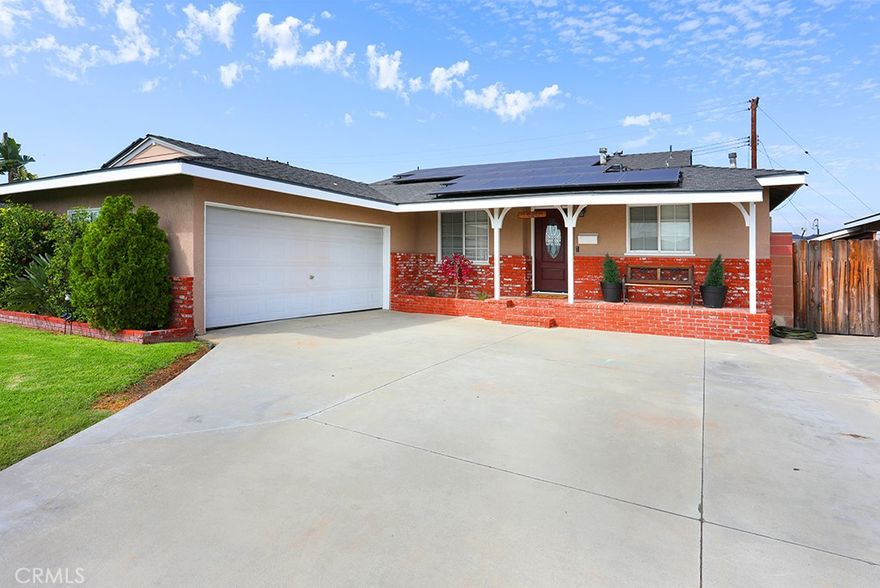 Welcome to East Whittier! This beautifully updated home offers a perfect blend of comfort and luxury. The inviting living room features a cozy fireplace accented with newer tile, recessed lighting, and stylish wide-plank luxury laminate flooring. The updated kitchen boasts newer cabinets, elegant marble counter tops from Africa, a custom backslash, soft-close doors, a mini-fridge, and a stylish farmhouse sink. The spacious main bathroom offers dual sinks, while the ¾ bath showcases an over-sized, glass-enclosed shower. The garage has been thoughtfully converted into an additional room—ideal for a home office, game room, or extra bedroom. An entertainer’s backyard awaits with a refreshing pool, a covered patio complete with built-in BBQ, TV, and mini-fridge, plus a grassy side yard perfect for play or pets. The extra-wide driveway provides ample parking for multiple vehicles. With over $150,000 in upgrades, this home truly offers too many features to list—every space reflects quality and care. Paid solar panels and a newer 4-ton A/C and heater help keep the home energy-efficient and comfortable year-round. Conveniently located within walking distance of the elementary school.