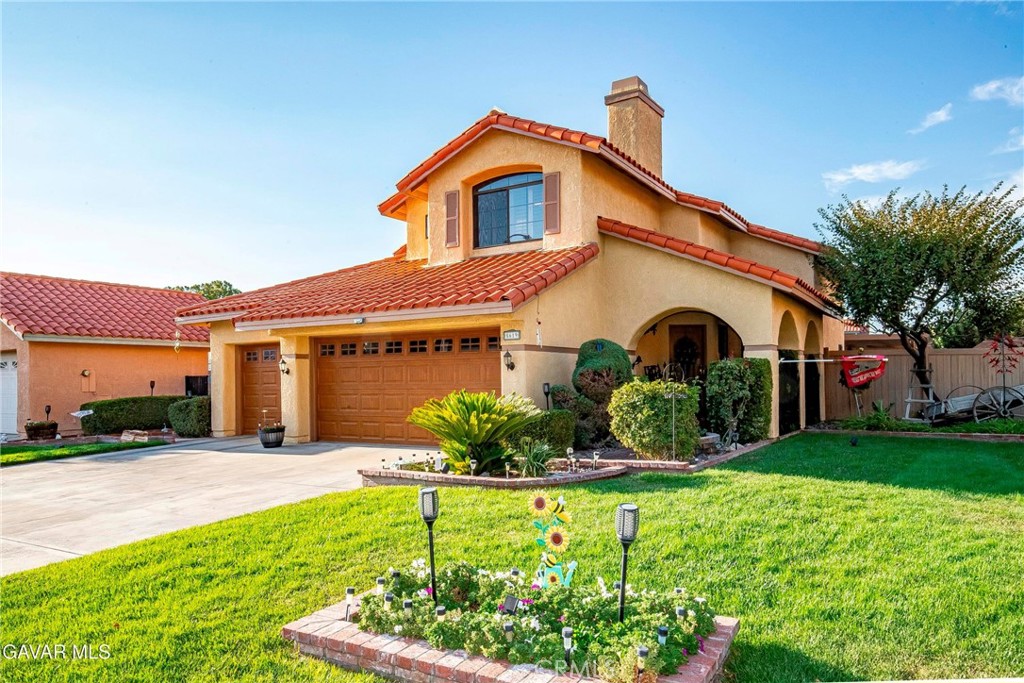 THE BEST OF BOTH WORLDS, INSIDE AND OUT! The Front Yard is manicured with Mature Landscaping and a Brick Pathway that leads you to the Gated Brick Courtyard. You are there surrounded by more Lush Landscaping and immediately you know: This Feels Like Home! This Lovely Home features High Contemporary Ceilings for a Bright Open Feel. You will enjoy entertaining in the Formal Living and Dining Rooms. Great for the day to day life is the Family room with a Cozy Brick Fireplace. The Kitchen is Large with Lots of Cabinets and Countertops. The Center Island features a Butcher Block Top for the serious Cook in the Home. There is a Bedroom and Full Bathroom Downstairs as well as the Laundry Room with a Utility Sink. You'll Love the Master Suite. It is Spacious with a Walkin Closet, a Sitting Area and a Private Balcony with a Magnificent View. The Master Bath features Dual Sinks and a Separate Tub and Shower. There is also a Full Sized Second Family Room Upstairs with another Cozy Fireplace. THE YARD FEELS LIKE YOUR OWN PRIVATE PARK with Mature Trees, an assortment of Lovely Plants displaying Variety, Color and Dimension. There are no shortage of Solar Lights which make the yard sparkle at night. There is an Inground Spa and a Huge Covered Patio that wraps around three sides of the home. This Home and Yard have been Nurtured and Loved. Special touches in this home include a Dramatic Entry; Laminate Wood Flooring Downstairs; Plantation Shutters Throughout; Backlighting Detail in the Dining Room; the home was recently Painted In and Out, there are Ceiling Fans almost everywhere; there is Tinting on some Windows; Garage Doors Replaced, the Side Vinyl Fence Replaced; the Patio was Redone; the home has Solar plus Battery Backup and you'll love the New Wood/Iron Side Gate. YOU WON'T WANT TO MISS THIS ONE!