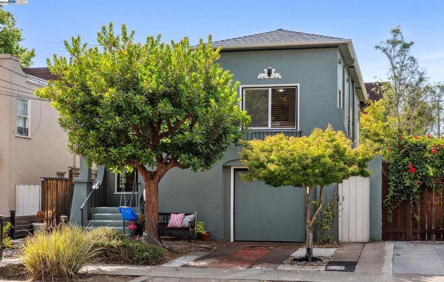 Charming and updated 1925 bungalow in Central Alameda. This home features many original charms combined with everyday comfort. Features hardwood flooring, a lovely living room with a brick fireplace, original windows and a spacious dining room ideal for gatherings. The sunny kitchen features refinished cabinets, new counter tops and a cozy breakfast nook overlooking the outdoor area. The detached garage/ basement bonus space is a wonderful home office or artist’s space, gym, while lots of space allows for a small workshop or extra storage and laundry area. EV Charger next to driveway. The cozy back yard with pavers and mature greenery offers privacy ideal for entertainment. Just moments from the Alameda Theatre, Park Street dining, top-rated schools, local parks, and public transit.