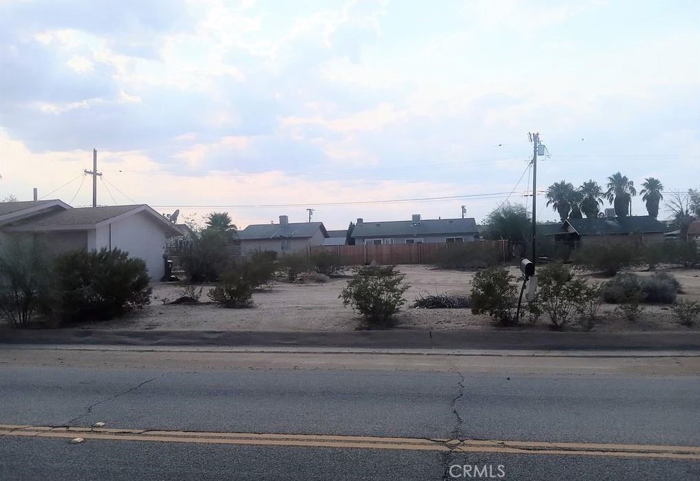 Less than a mile from 29 palms hwy sits this beautiful parcel of land . Close to home and utilities . This property would make a great investment opportunity or a place to build your dream home .