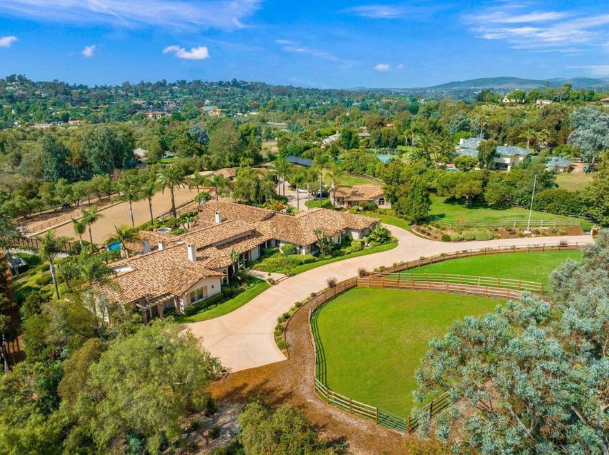 Gorgeous Covenant Equestrian Estate includes two complete homes! Extremely private, quiet single level home with lush landscaping, infinity edge pool, koi pond, outdoor living spaces AND a 1500 sf 2 bed, 2 bath guest house with  kitchen, living room, fireplace, its own private patio and 3 parking spaces. Also an excellent opportunity for car lovers, tennis or pickle ball, this estate includes solar and a fantastic well & filtration system that handles all irrigation. Over 4 usable acres with rare 7 horse permit, gorgeous courtyard 7 stall barn, in-and-outs, regulation dressage arena (expandable to jumping) with prof. footing, 7 turnouts, trailer parking, hay storage, tack room, cross-ties, on-site bridle path and Covenant trail access. Immaculate and ready to enjoy!  Main residence is 5 bedrooms, all en-suite with walk-in closets, 5 1/2 baths plus office. The home is wired for custom sound and lighting. Guest house is 1500 sf and includes 2 bedrooms, 2 baths, kitchen and laundry. Property has a rare Covenant "L" Designator and a 7 horse permit. Barn is set up for 7 horses with large in-and-outs, laundry, bathroom, tack room and two storage rooms and arena has  professional sand and felt footing, large mirrors and drainage system. Width is expandable to jumping size. Owned solar and well, plus a generator sufficient to fully operate the guest house for days if ever needed!