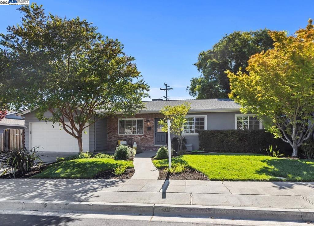 Welcome to 8460 Valencia Street, a beautifully refreshed, NE-facing, single-story home in one of Dublin’s most established neighborhoods. From the moment you arrive, the curb appeal draws you in, and the updates seal the deal: new hardwood flooring, plush carpet, new baseboards, fresh interior paint, sleek quartz countertops with a subway tile backsplash, newer appliances, including a gas cooktop, and a newer HVAC system. The bright kitchen opens seamlessly to the dining and living areas, creating a warm, connected space perfect for everyday living or lively entertaining. Additional highlights include dual-pane windows, epoxy-finished garage floor, and a private backyard with a covered patio, a cozy fire pit, and a storage shed, ideal for relaxing evenings, weekend gatherings, or simply enjoying the outdoors. With easy access to top-rated schools, beautiful parks, shopping, and commuter routes, this home offers the perfect blend of style, comfort, and convenience.