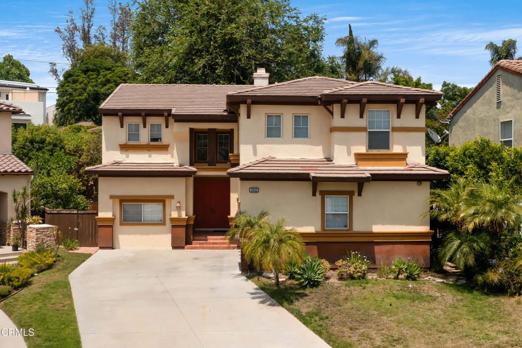 Charming Studio City home with Modern Comfort! This lovely 4-bedroom, 3-bathroom home is in a quiet and safe part of Studio City. It has lots of space and feels warm and welcoming. The living room is big and bright with tall ceilings and large windows. This is an excellent space for relaxing or spending time with family. The kitchen is an entertainer's dream, featuring large countertop space and a spacious open area for guests to gather nearby. There is a second living room attached to the kitchen, featuring built-in storage and a large fireplace. This space makes a great dining experience for family and small gatherings. The kitchen also opens to the backyard space for an indoor/outdoor experience. Heading upstairs, you enter the large loft area, which is great for use as a home office or recreation space. The primary bedroom is adjacent to the loft and benefits from tall ceilings, a large private bathroom, a spacious walk-in closet, and ample space for a king-size bed with large furniture. Down the hall you will find two additional bedrooms that are great for kids and guests. The backyard is full of trees and plants, with a cozy space to sit, eat, or play. The home also has a full laundry room, large two car garage, central heating and air conditioning, and a desirable location on a private cul-de-sac. The location is also convenient, situated near parks, schools, shops, and restaurants. If you're looking for a quiet and comfortable place to live in Studio City, this is it!