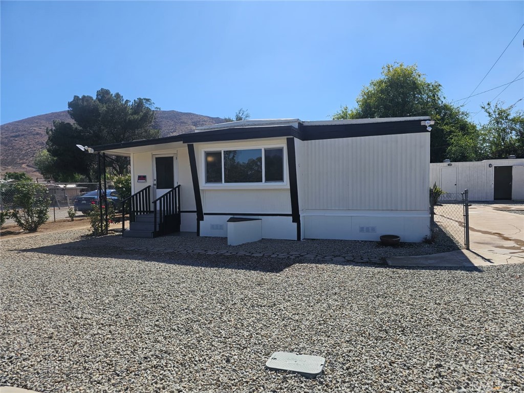 Reduced.Gorgeous Remodeled Ranch Home in a Great Area of Hemet it is in West Hemet almost borderline Winchester. This home is on a Huge piece of land that has an RV space and hook up. This home is on a culdesac with ample room for entertaining. This home is very spacious it has an open floor plan. This home has new windows,laminate flooring,new fans,new lights,new bathrooms,plenty of storage and patio cover perfect for entertaining also this home has huge storage in the the backyard plenty of room to park cars and two drive ways. This home will not last.