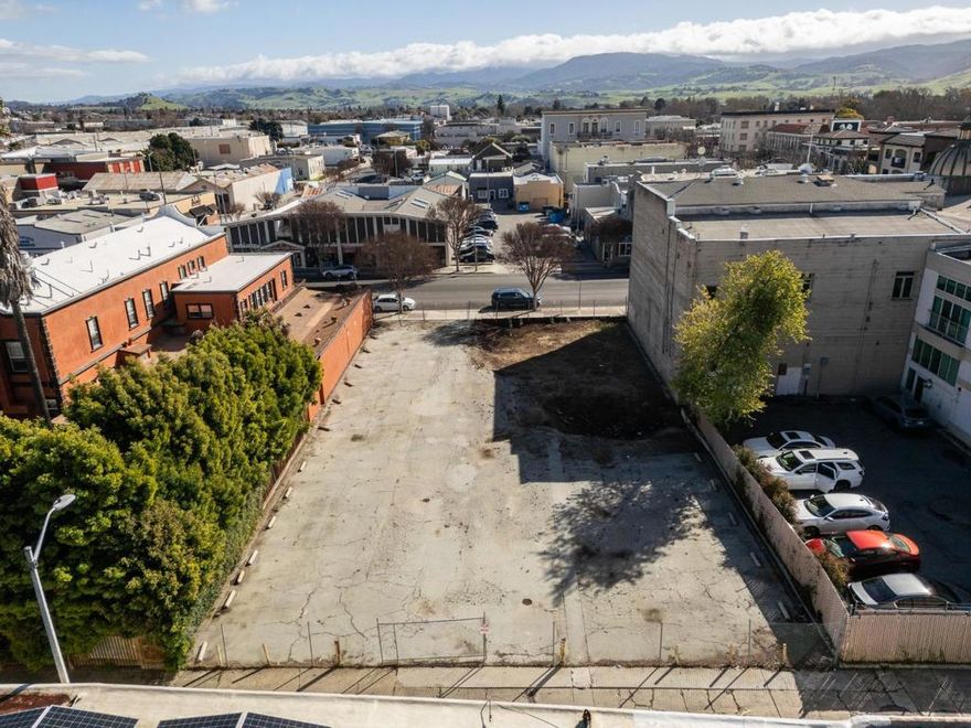 Fantastic opportunity to own and develop a Mixed Use vacant lot in the HEART of Downtown Hollister! One building away from the main street of San Benito St., walking distance to dining/shopping/schools/entertainment/churches/commute access/multi-family living and City Services. The zoning allows for commercial, residential or a mixture of both. Imagine townhouses up and a commercial business down. Parking included. Access this property both from Fourth St. or the alley on the other end which backs up to Baler Market. Seller has some reports available. The central location and zoning flexibility make it a promising investment opportunity for various development projects.