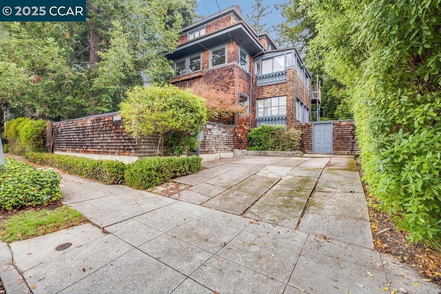 Historic Charm in the Heart of Elmwood. Step into this beautifully preserved Craftsman nestled in a tranquil, tree-lined setting w/in Berkeley’s highly sought-after Elmwood neighborhood. Situated on the 1st level of an attractive 3-unit brown shingle building, this home exudes timeless character & classic design. Inside, you’ll find spacious rooms enhanced by hardwood floors, high ceilings, stained glass windows, rich wood trim, & elegant pocket doors. The inviting living room features a wood-burning fireplace, the formal dining room—w/ built-in cabinetry—opens to a charming balcony. The kitchen blends vintage appeal w/ modern updates, featuring a generous center island w/ breakfast bar, newer appliances, floating shelves, & large windows that fill the space w/ natural light. A convenient laundry nook adds functionality. The grand bedroom offers a cozy retreat, while the sunroom—bathed in natural light—makes an ideal office, den, art studio, or guest room. Outside, enjoy a peaceful, park-like shared backyard shaded by towering redwoods—an oasis that feels worlds away yet is just minutes from UC Berkeley, Greek Theater, Julia Morgan Theater, College Ave shops & cafés, public transit & commuter routes. Add'l highlights: assigned parking spot & basement storage.