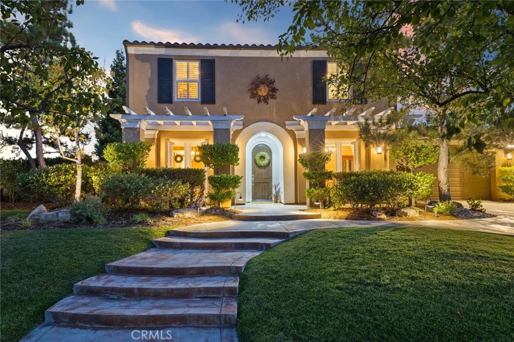 Located in West Templeton's high-demand Vineyards Development and a premier school district, this 3-bed, 3-bath plus bonus room Italian-inspired villa offers a life where every day feels like an Italian getaway. The welcoming, open floor plan flows seamlessly from a formal dining room into the gourmet chef's kitchen. Large, strategically placed windows throughout this main living area frame the spectacular backyard views like living works of art, bathing the space in natural light. An entertainer's dream, the kitchen features all recently replaced premium stainless steel appliances, a built-in refrigerator, granite countertops, and a spacious island. Nearby, a climate-controlled wine cellar awaits your collection. Retreat to the primary suite, a peaceful sanctuary with stunning vineyard and mountain views from oversized windows. The spa-like ensuite is well-appointed with dual sinks, a spacious walk-in shower, a separate soaking tub, a private water closet, and impressive dual walk-in closets providing ample storage. The backyard transports you to an Italian countryside sanctuary. Imagine lounging on the baja shelf of the shimmering, heated pool while gazing at panoramic views of Santa Rita Creek and the rolling vines of ONX Estate Vineyard. This professionally landscaped oasis includes raised garden beds for a farm-to-table lifestyle and is the perfect setting for unforgettable al fresco dining under the stars. A versatile bonus room off the garage is the ideal blank canvas for your art studio, home gym, or quiet home office. This exceptional retreat flawlessly blends breathtaking views, resort-style amenities, and European charm into a unique lifestyle experience. Don't miss this rare opportunity to purchase the only home currently available within this development. Schedule your private tour today!