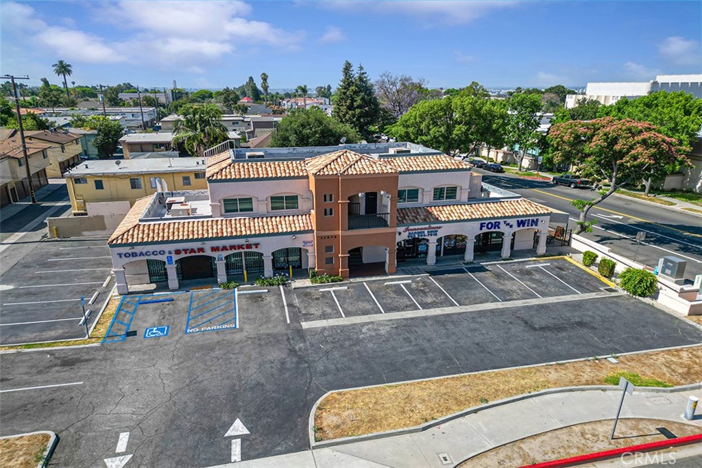 Welcome to 12602 Hadley St, Whittier Ca 90601— a highly visible, mixed-use commercial building offering exceptional curb appeal, ample parking, and versatile potential. Featuring five total units. Situated in a high-traffic area, this well-maintained two-story structure is perfect for investors, business owners, or entrepreneurs seeking a customizable space in a prime location. The ground floor retail spaces enjoy excellent signage visibility, covered front access, and ample front-facing parking, allowing for high customer convenience. Upstairs, a spacious offices suite bathed in natural light and offers an open-concept layout, perfect for professional or creative use. The property also features a dedicated parking lot. Strategically positioned in Uptown Whittier’s popular shopping and dining district, this asset benefits from strong foot traffic, high daily car counts, and convenient access to major streets and highways. Whether you are looking to launch your own business, lease out units for steady rental income, or redevelop the site further, this opportunity provides a solid foundation in a sought-after commercial corridor. Do not miss your chance- scheduled for your private showing today!