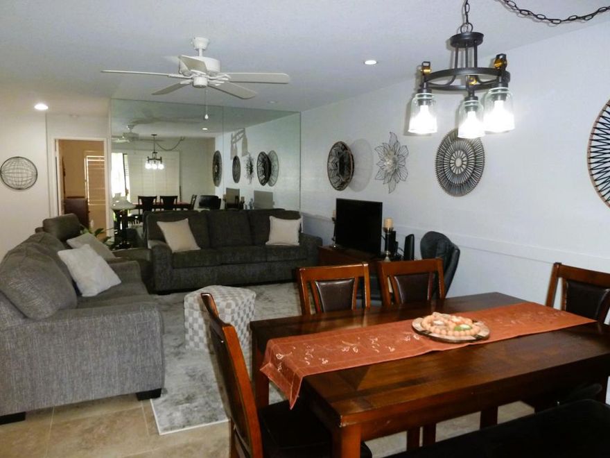 Large, upgraded one bedroom condo that is currently furnished as a two bedroom.  This condo holds two king size beds in separate and private spaces.  Patio faces west with water feature and west mountain views.   Beautiful tile floor throughout.    Patio is also tiled.   This condo is located in Canyon Shores, a resort style community strategically located between Palm Springs and Palm Desert.   Five (5) pools, 7 spas, 2 community saunas and a community gym, tennis courts and pickleball courts - all ready for your enjoyment.   Perfect for seasonal or full time occupancy.   Brand new roofs installed throughout Canyon Shores in April/May 2025.   The Coachella Valley Link (CV Link) is complete and runs from Cathedral Canyon Drive all the way to Gene Autry Trail in Palm Springs and Date Palm in Cathedral City.   Designed for walkers, runners, bikers and even golf cart drivers, the 'CV Link' and the sidewalks recently installed on Cathedral Canyon make Canyon Shores very walkable to downtown Cathedral City and points beyond.Come take a look.