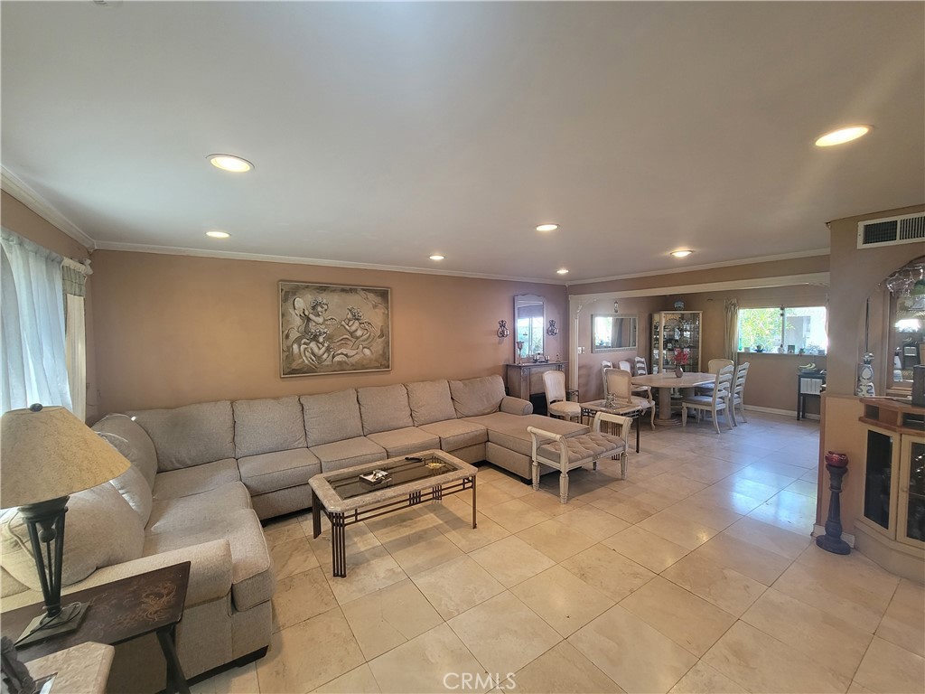 Welcome to this beautiful 2-story townhouse located in a highly desirable community offering resort-style living. The home features spacious interiors with updated finishes, an open layout designed for both comfort and entertaining, and a private outdoor area to relax and unwind. Residents enjoy outstanding amenities including sparkling swimming pools, tennis courts, and lush park-like grounds with walking paths. Conveniently situated near shopping, dining, and major freeways, this townhouse combines comfort, convenience, and a vibrant community lifestyle.