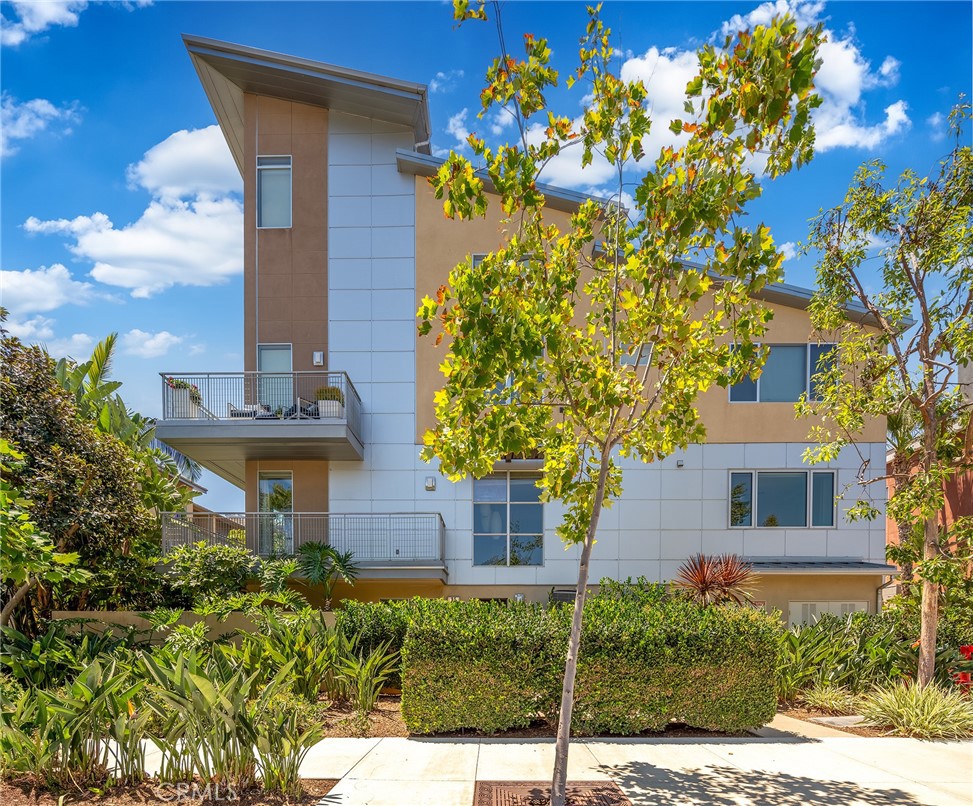 Welcome to the epitome of modern luxury living in Central Park West, Irvine. It is better than model homes.Nestled in the highly sought-after Chelsea neighborhood, this spectacular "loft-inspired" home offers a lifestyle beyond compare. Boasting 3 bedrooms and 3 full baths, this residence is a testament to spacious and contemporary living, featuring upgraded flooring throughout. As you enter the main level, you're greeted with a private space, complete with a stylish ensuite bath, making it an ideal guest bedroom or a perfect spot for a home office. The modern staircase leads you to the second-level living area, where chic design meets ultimate functionality. The abundance of natural light flooding this space is a defining feature, illuminating every corner of this beautiful home. The heart of this residence is the fabulous kitchen, which is adorned with rich cabinetry, a generous island with seating, granite countertops, and high-end Viking appliances. The large dining area seamlessly flows into the stunning main living space, where a statement fireplace and glistening sliders invite you to the private deck/patio, offering breathtaking views of the community pool and other outdoor amenities. For moments of relaxation, retreat to the expansive main bedroom suite with an exquisite ensuite bath that carries forward the elegant dark cabinetry, granite counters, and a glass shower. A spacious walk-in closet provides ample storage. A delightful second guest room and a sophisticated full bath complete the second-level living space, ensuring comfort and functionality. Immerse yourself in the extraordinary amenities Central Park West and the Chelsea neighborhood have to offer, all with the lowest lifestyle fees. The community's centerpiece features a 14,000-square-foot Clubhouse and Recreation Pavilion, thoughtfully designed for both indoor and outdoor enjoyment, celebrating the coastal lifestyle. Situated just moments away from premier shopping and entertainment destinations like Fashion Island, South Coast Plaza, The Marketplace, Irvine Spectrum Center, and The District, this home's location is second to none. You'll also enjoy easy access to cultural venues, including OC Performing Arts, South Coast Repertory, OC Museum of Art, and the art galleries of Laguna Beach. Additionally, you're only minutes from the most coveted coastlines and pristine, sandy beaches.