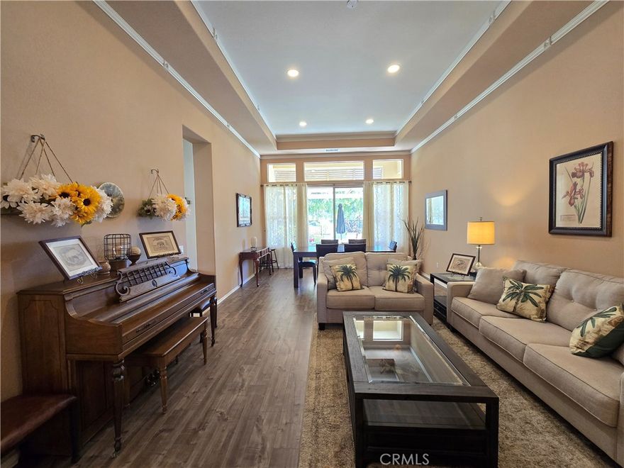 Live the good life in this beautiful turnkey home in one of Menifee’s most sought-after 55+ gated communities — The Oasis.

Welcome to this immaculately maintained 2-bedroom, 2.5-bath single-family home offering 2,382 sq. ft. of bright, spacious living. Located within a guard-gated senior community, this residence perfectly combines comfort, elegance, and resort-style amenities.

Step inside to find tile flooring in the entry and kitchen, laminate wood floors in the living areas and office, and high ceilings that create an open, airy feel. The kitchen features granite countertops, generous cabinet space, and includes all appliances — refrigerator, microwave, washer, and dryer.

Enjoy serene outdoor living with a charming front porch and a back patio overlooking the golf course, perfect for morning coffee or evening relaxation.

Additional highlights include a 2-car attached garage and a shed for additional storage and access to the community’s premium amenities, featuring:

24-hour guard-gated security

Swimming pool and spa

Fitness center and library

Tennis courts and billiards room

Plenty of other activities listed on the upcoming events bulletin posted in the clubhouse

This move-in-ready home is the perfect blend of luxury, comfort, and active adult living — everything you need to enjoy your next chapter in style.