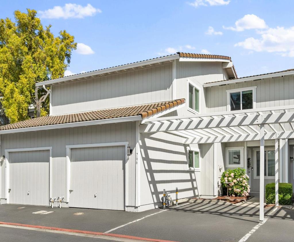 Prime Los Gatos location in a small, quiet community where homes rarely become available! Walk to Netflix, Jack Fischer Park, Los Gatos Creek Trail. Zoned for top-rated Marshall Lane Elementary, Rolling Hills Middle, and Westmont High School. This beautifully updated 3-bed, 2.5-bath townhome offers 1,516 sq ft of comfortable, modern living. Enjoy new wide plank Diamond-grade LVP flooring throughout, new dual pane windows and slider, recessed lighting on dimmers, and designer fixtures throughout. Enter through a covered porch with newly installed tile into a spacious living room with fireplace and access to a large private patioideal for outdoor dining and entertaining. The remodeled kitchen features stainless steel appliances, white shaker cabinets with ample storage space, and marble counters and backsplash. Upstairs, the large primary suite boasts vaulted ceilings, a walk-in closet with newly installed Elfa system, plus a second built-in closet, and a stylish en-suite with dual vanity and shower over tub. Two additional spacious bedrooms plus a second full updated bathroom located upstairs. Attached garage with laundry and extra storage. Minutes to downtown Los Gatos, Campbell, and Saratoga! Enjoy nearby parks, trails, farmers markets and easy access to major commuting.