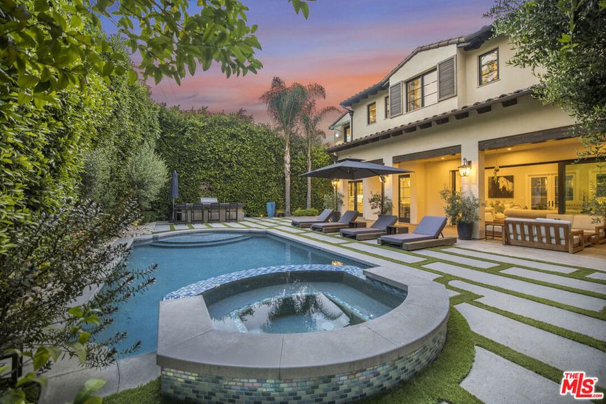 Nestled in one of the most desired neighborhoods, this beautiful Italian villa, built in 2016, blends charm with modern luxury. Spanning three levels, this architectural masterpiece sits on a generous lot and boasts stunning details throughout, including exposed wood beams that add warmth and character.Step inside to a grand entryway that leads to spacious living areas filled with natural light and high ceilings. The gourmet chef's kitchen is a dream, featuring high-end appliances, custom cabinetry, and an oversized marble island perfect for entertaining. The seamless indoor-outdoor flow opens to a breathtaking courtyard, a private oasis ideal for relaxation.Outside, the backyard offers a pool, spa and bbq area, creating the perfect setting for entertaining or unwinding under the California sun. For ultimate luxury, enjoy movie nights in your private home theater.This exceptional home offers an unparalleled lifestyle in an unbeatable location. Don't miss the opportunity to own a true Beverly Hills gem! Fully Furnished.