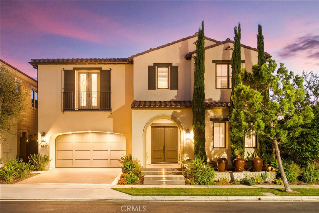Former Model Home in The Grove at Orchard Hills | Rare Corner Lot | $1.3M+ Luxury Upgrades & Avocado Hill Views
Situated on a single-loaded street in The Grove at Orchard Hills, this rare corner-lot estate offers unmatched privacy with no neighbors on three sides and serene avocado hill views. Over $1.3M in upgrades, including luxury wide-plank wood floors throughout, stunning glass floating staircase, luxury custom draperies, mornden fireplace in the great room, sliding glass doors in both the kitchen and living room, fully custom interior paint, upgraded cabinetry, and premium countertops, make this former model home truly one of a kind.
The 5-bedroom, 5.5-bath layout features a spacious loft upstairs and a rare first-floor suite with its own living room and fridge— perfect for guests or multi-generational living. The chef’s kitchen boasts floor-to-ceiling glass cabinetry, Wolf appliances, a 48” Sub-Zero French door refrigerator, and dual islands, one seating up to seven. The formal dining area includes two Sub-Zero wine fridges and wood-beam accents.
The California room offers year-round entertaining with wood ceiling, built-in heaters, motorized shades, and bar seating. The backyard features a Jacuzzi spa, waterfall, custom lighting, elegant hardscape, and lush landscaping filled with vibrant flowers and greenery.
The luxurious primary suite includes a Wolf coffee station, Sub-Zero fridge, private oversized balcony, spa-like bath, and a custom walk-in closet designed like a high-end boutique.All other suites have also been thoughtfully designed by designer, showcasing exquisite attention to detail and refined style.
Additional highlights: upgraded sound system, smart home features, paid solar, water filtration/softener, Tesla charger, and select custom CB2 furniture included.
A perfect blend of privacy, luxury, and design — ready for you to move in and enjoy the Irvine lifestyle at its finest.