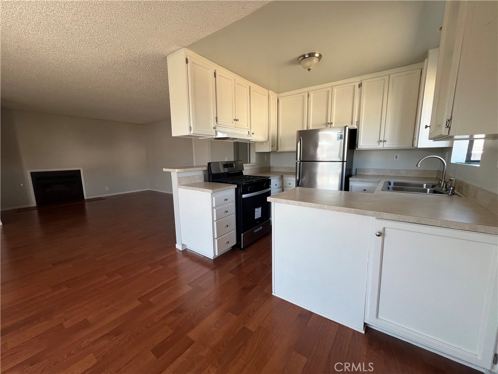 Welcome to this bright and inviting 2-bedroom, 2-bath, and top-floor condo- privately situated as a corner end unit within a secure gated community.
Enjoy fresh breezes from the large private balcony—perfect for relaxing or entertaining. Inside, the open-concept layout features stylish laminate flooring, a cozy fireplace, and a dining area that flows seamlessly to the outdoor space.
The spacious primary suite includes a private en-suite bathroom, and both bedrooms offer generous proportions. This home is move-in ready with newer stackable in-unit laundry and two assigned side-by-side parking spaces in a gated underground garage for added convenience and peace of mind.
Ideally located near shopping, dining, El Camino College, SoFi Stadium, LAX, local beaches, and with easy access to the 110, 105, 405, and 91 freeways—this one checks all the boxes!